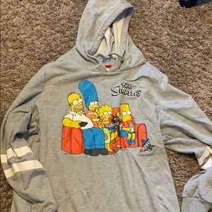 Simpson’s long sweater